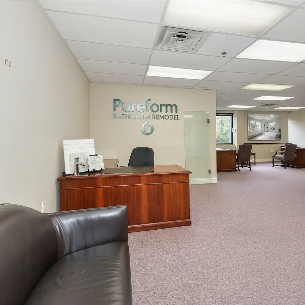 Pureform Bathroom Remodel office interior with company logo on wall in Burbank, CA